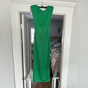 Green open back, sexy evening dress. never worn. Size medium. Lined at chest